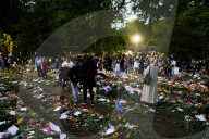 People mourning the death of the Queen