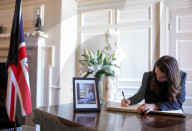 Prime Minister Liz Truss international Meetings and signing the book of condolence.