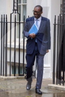 Kwasi Kwarteng UK Chancellor of the Exchequer leaves 11 Downing Street to deliver The Growth Plan to parliament
