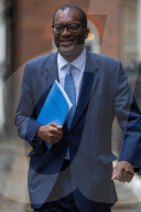 Kwasi Kwarteng UK Chancellor of the Exchequer leaves 11 Downing Street to deliver The Growth Plan to parliament