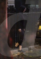 Liz Truss leaves Downing Street dressed for her morning run.