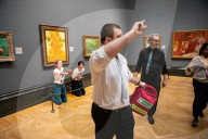 Climate activists splattered what appears to be tomato soup on "Sunflowers" by Vincent van Gogh