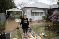 'Just too much rain': small-town Australians survey damage after massive flooding