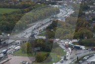 Just Stop Oil protest at Queen Elizabeth Bridge over The River Thames in Dartford.