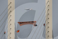 Just Stop Oil protest at Queen Elizabeth Bridge over The River Thames in Dartford.