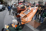 Just Stop Oil block a junction in Holborn, central London.