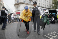 Just Stop Oil block a junction in Holborn, central London.