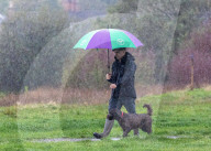 Public brave the flash flooding in Putney High Street south west London.