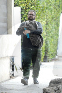 CherÍs son Chaz Bono, 53, is seen for the first time since his superstar mom, 76, went public with her new toyboy lover Alexander ïAEÍ Edwards, 36.