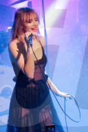 Suki Waterhouse performing at Les Etoiles in Paris