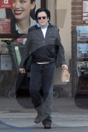 Hollywood actor Michael Madsen, 65, looks almost unrecognizable as he runs errands in an Uber more than three years after his high profile DUI case. 
