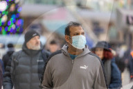Public urged to wear face masks due to surge in Covid and Flu. 
