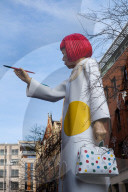 15m sculpture of artist Yayoi Kusama is seen outside Harrods, London, UK.
