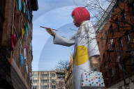 15m sculpture of artist Yayoi Kusama is seen outside Harrods, London, UK.