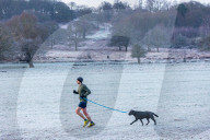 Freezing conditions with frost and snow for Richmond Park south-west London UK.