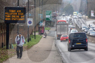 A sign warning drivers of high pollution levels in London, UK.