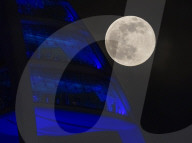 Snow moon rises over Portsmouth, UK. 