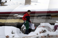 NEWS - Erdbeben Türkei-Syrien: Zerstörte Bauten unter Schnee