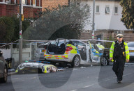 Police cars crash in Wandsworth, London, UK.