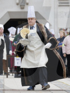 Shrove Tuesday pancake race in London, UK.