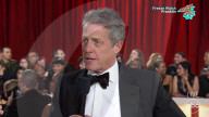 PEOPLE - Oscars 2023: Hugh Grant gibt unhöfliches Interview auf dem roten Teppich