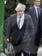 Former prime Minister Boris Johnson leaves his central London home.