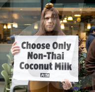 Whole Foods 'Monkey Business' has PETA dumping coconuts outside London store, UK. 