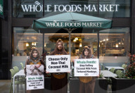 Whole Foods 'Monkey Business' has PETA dumping coconuts outside London store, UK. 