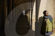 Manchester City councillor Ekua Bayunu outside the town hall and central library in the city centre