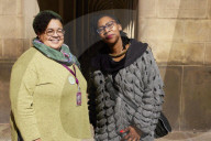 Manchester City councillor Ekua Bayunu outside the town hall and central library in the city centre
