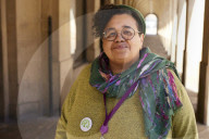 Manchester City councillor Ekua Bayunu outside the town hall and central library in the city centre