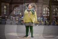 Manchester City councillor Ekua Bayunu outside the town hall and central library in the city centre