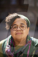 Manchester City councillor Ekua Bayunu outside the town hall and central library in the city centre