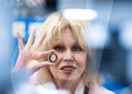 Joanna Lumley presses the first King Charles coins for Gibraltar at Tower Mint, London, UK.