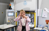 Joanna Lumley presses the first King Charles coins for Gibraltar at Tower Mint, London, UK.