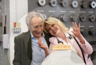 Joanna Lumley presses the first King Charles coins for Gibraltar at Tower Mint, London, UK.