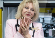 Joanna Lumley presses the first King Charles coins for Gibraltar at Tower Mint, London, UK.