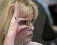 Joanna Lumley presses the first King Charles coins for Gibraltar at Tower Mint, London, UK.