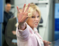 Joanna Lumley presses the first King Charles coins for Gibraltar at Tower Mint, London, UK.