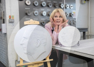 Joanna Lumley presses the first King Charles coins for Gibraltar at Tower Mint, London, UK.