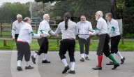 Greensleeves Morris Men dancing on Wimbledon Common, London.