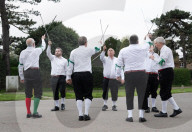 Greensleeves Morris Men dancing on Wimbledon Common, London.