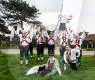 Greensleeves Morris Men dancing on Wimbledon Common, London.