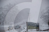'First proper day of winter': snow and hail blanket parts of NSW and ACT as cold front settles across south-east