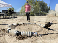 US space agency NASA shows off robot snake for exploring alien worlds.                             