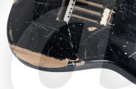 Smashed Kurt Cobain guitar sells for well over half a million dollars.                 