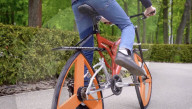 Square wheel bike maker returns with triangular ones           