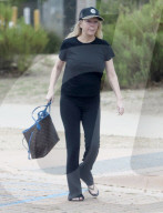 Heather Locklear is seen out in public for the first time in over eight months as she leaves a Malibu restaurant whilst showing off a new wrist tattoo in honor of her teenage daughter. 