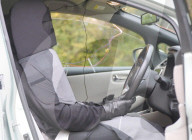 Driver disguised as car seat to for autonomous vehices study.                            