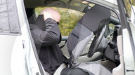 Driver disguised as car seat to for autonomous vehices study.                            